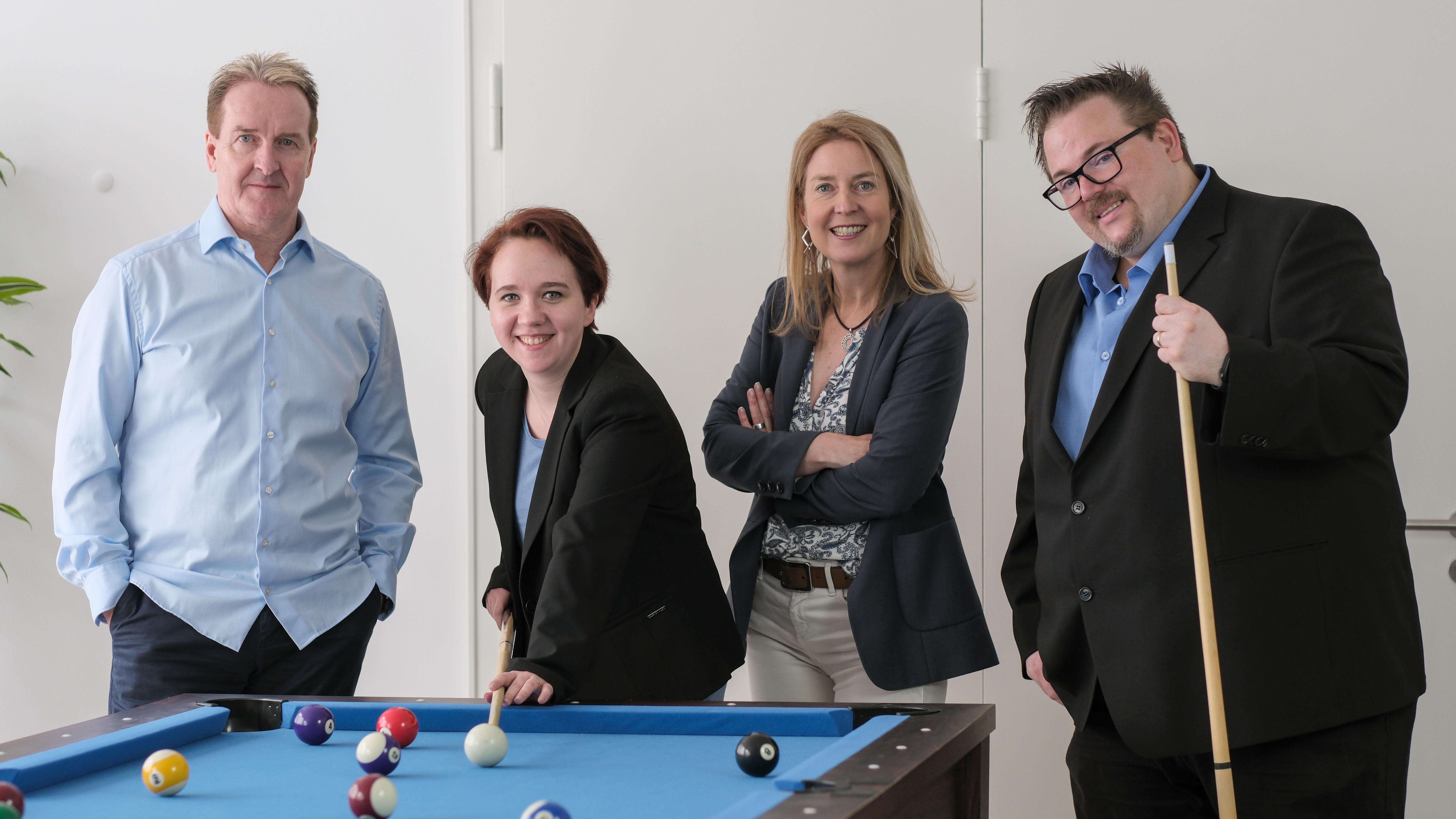 Das KremerLundehn-Team am Billiardtisch